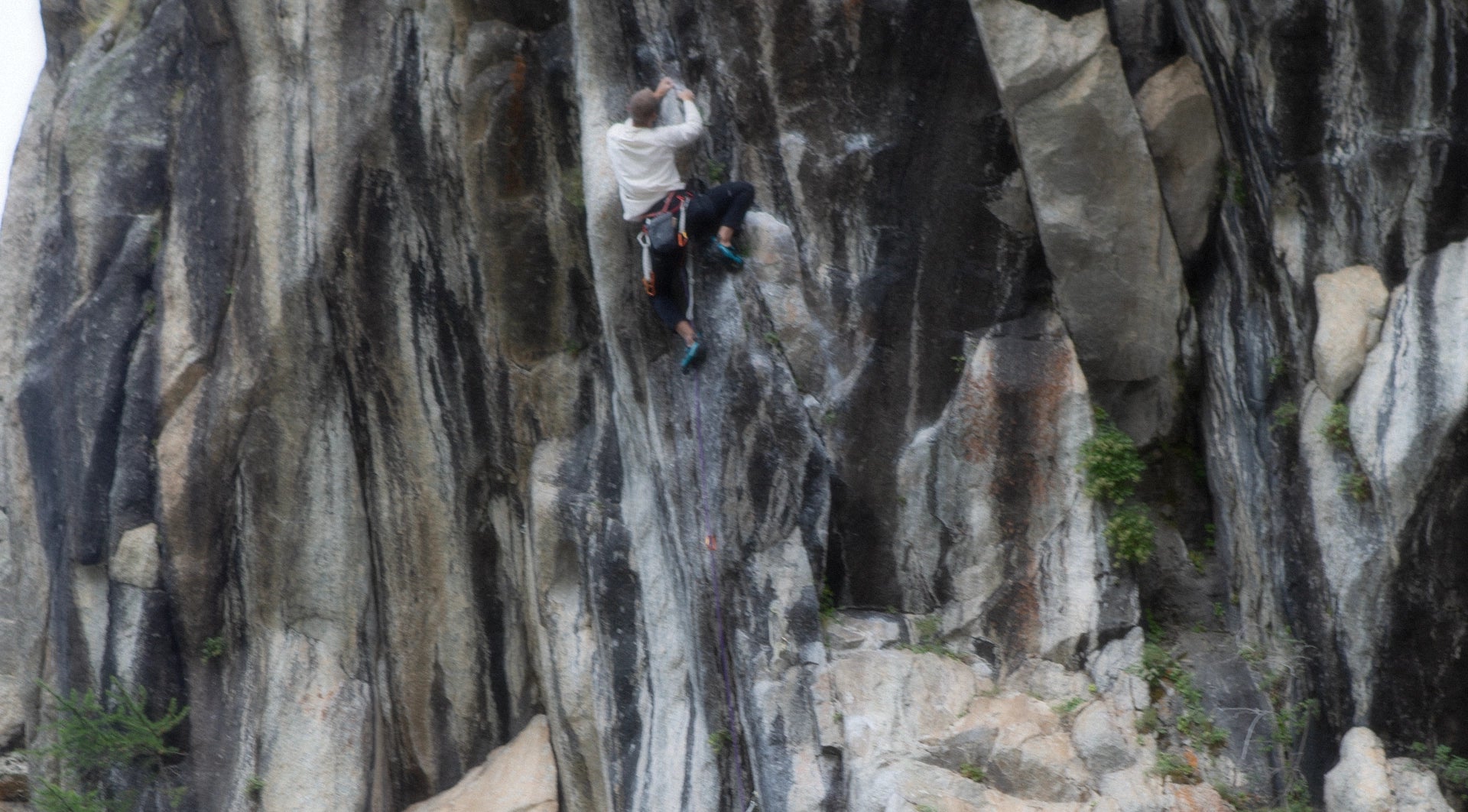 Sport climber in Face Bouc climbing crag in Briancon France.