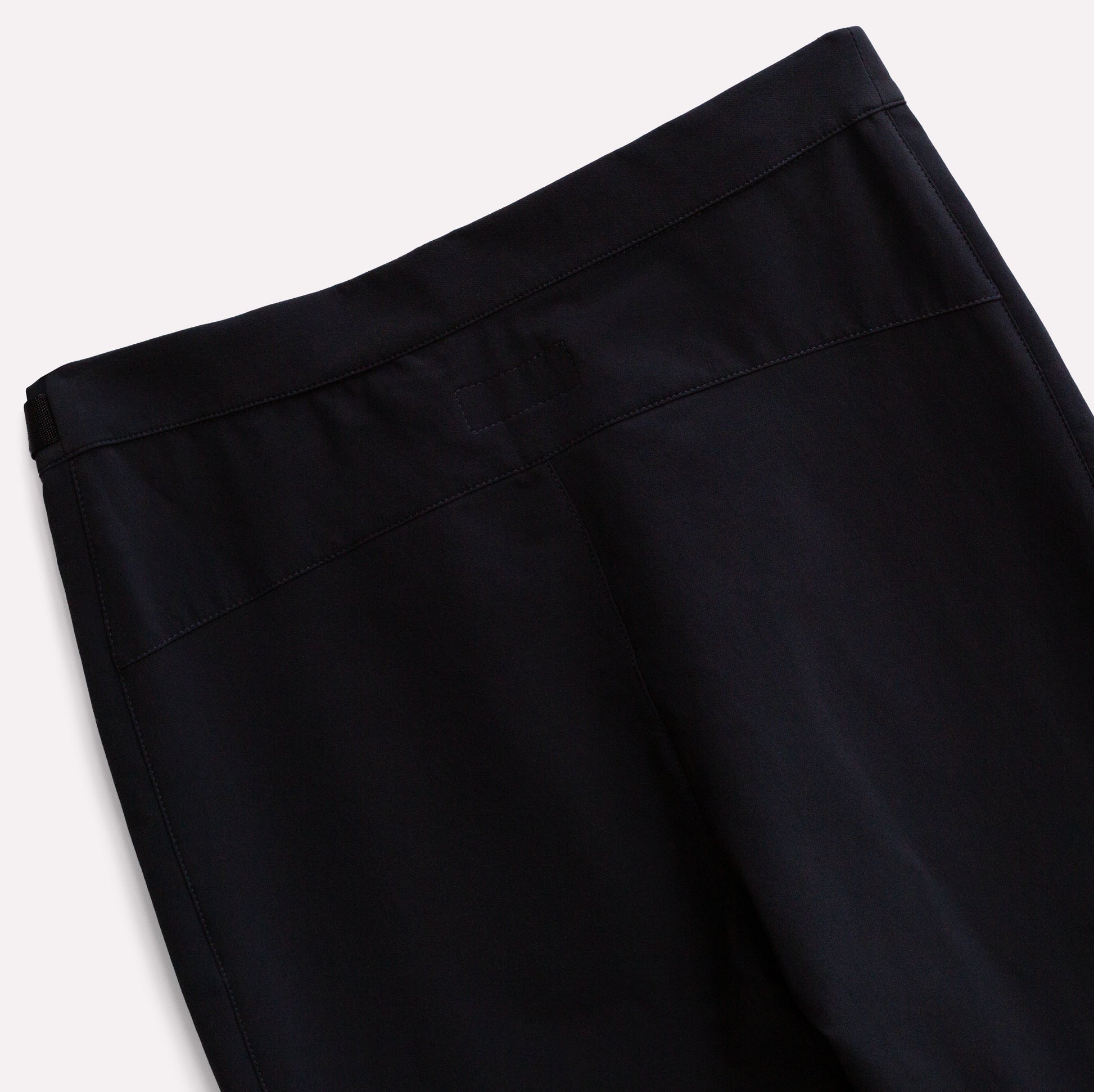 Black climbing pants in technical fabric.