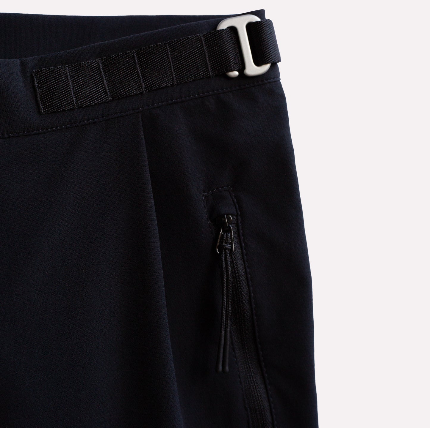 Technical pants for climbing in black lightweight fabric.