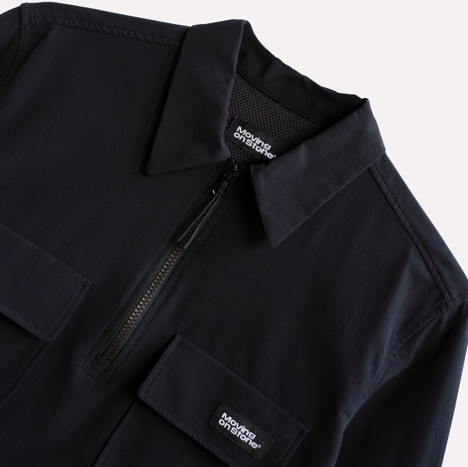 Technical climbing shirt collar detail half zip and pockets.