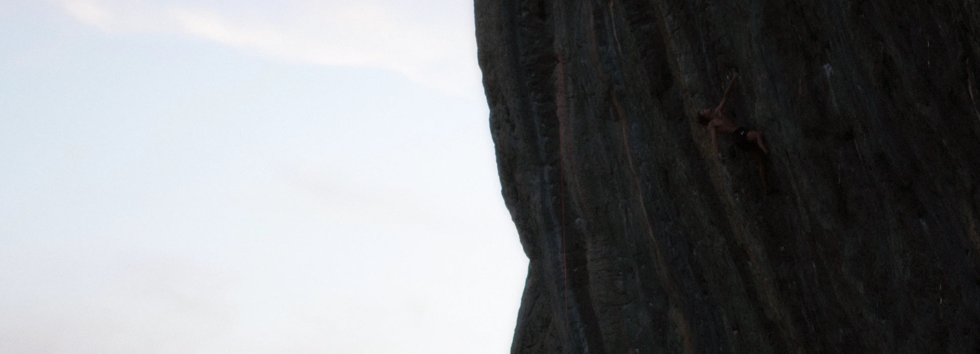 Climber enjoying rock climbing on limestone in the climbing area Ceüse in France.